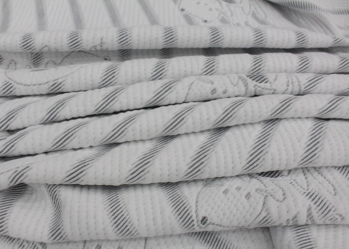 Đồ bán buôn màu trắng 100 Vải đan polyester Vải da mềm Mô hình vải nệm Vải nệm jacquard Vải